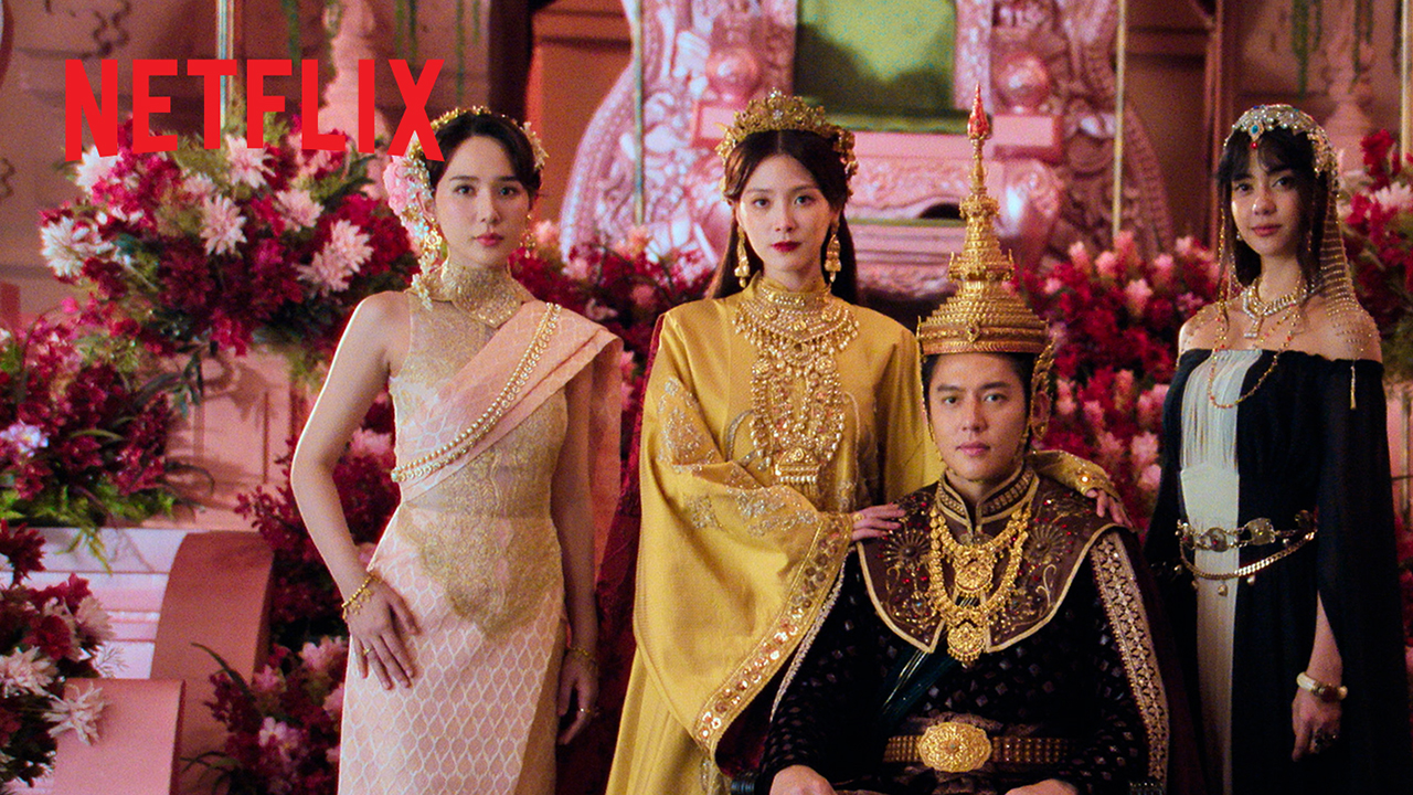 Three women in ornate royal dress stand around a seated crowned man in Netflix’s Empress of Flames promotional artwork.